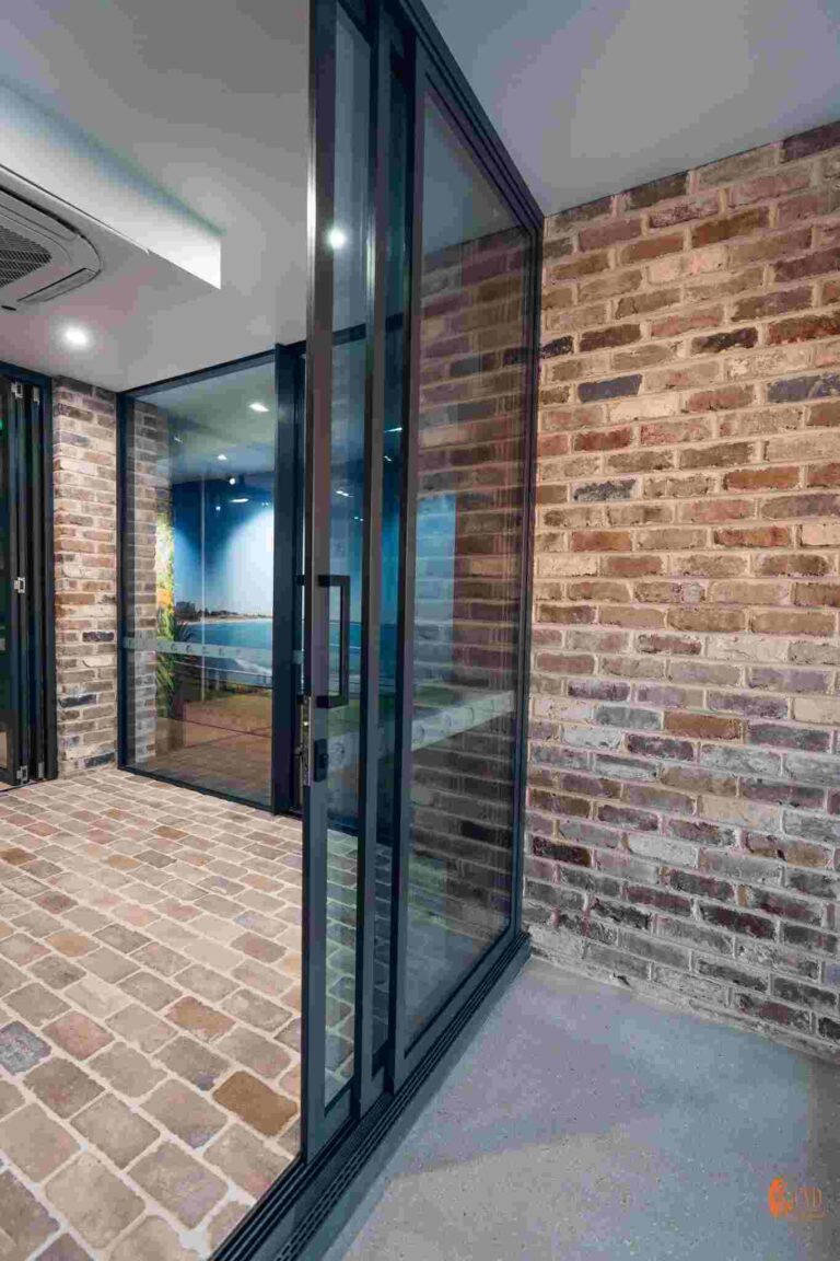 Modern Aluminium Sliding Door Installation in Brick Wall Interior